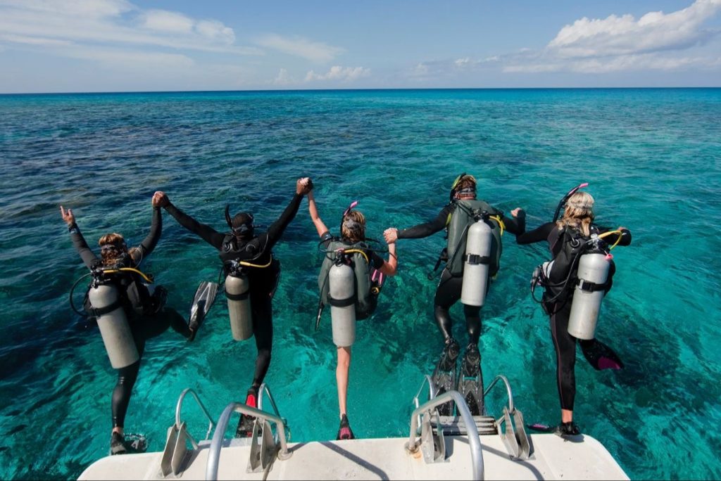 divers stepping off