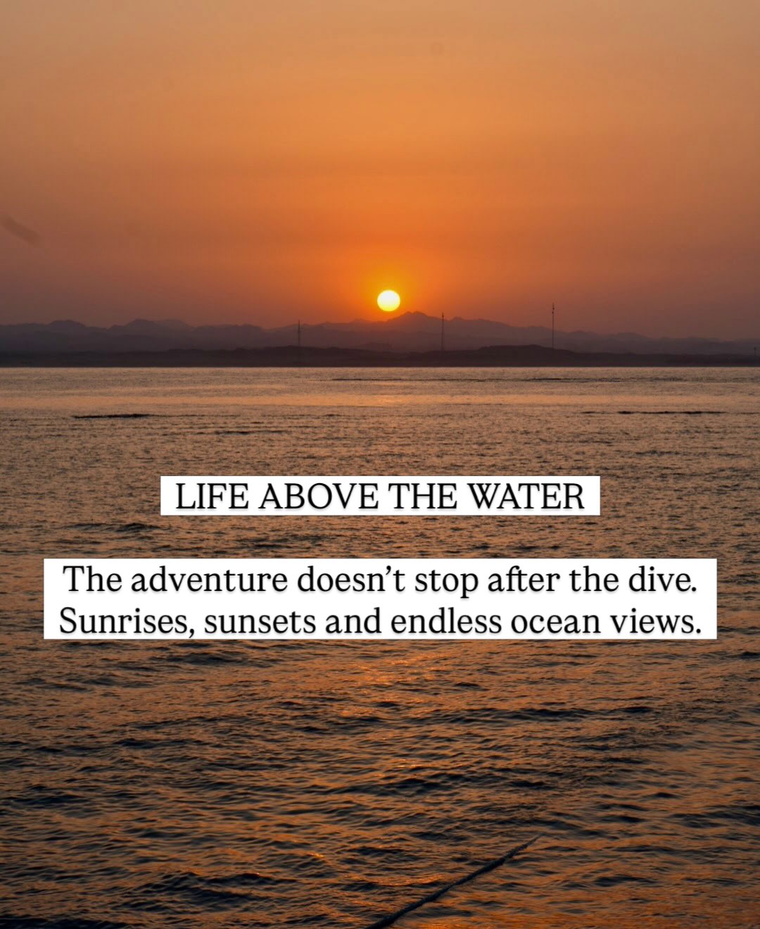 Sunset over mountains and calm water on the Egyptian Red Sea coast