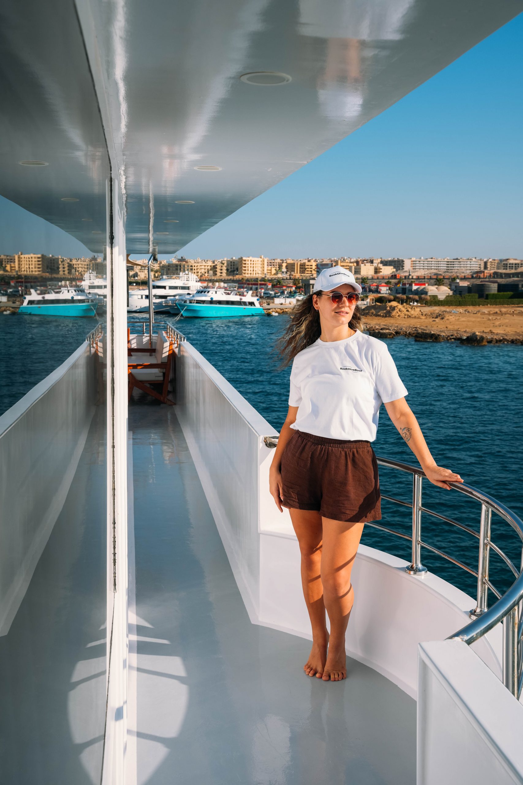 BookDiveBoat guests in branded merch