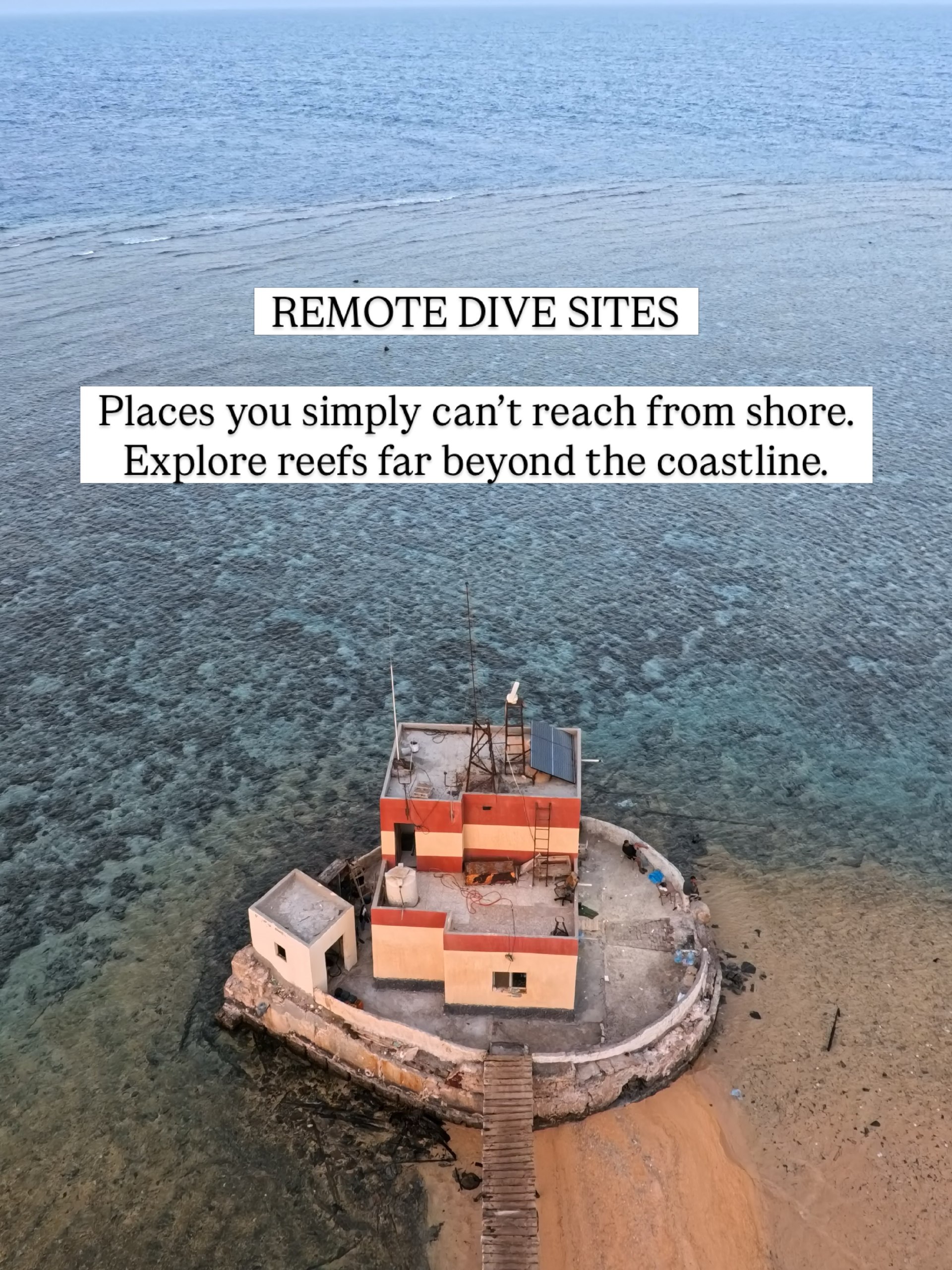 Aerial view of a small reef station surrounded by shallow turquoise water in the Red Sea