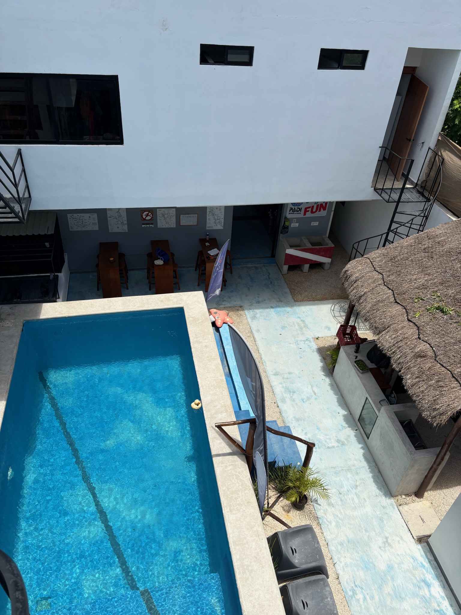 Aerial view of the Infinity2Diving courtyard and pool in Tulum