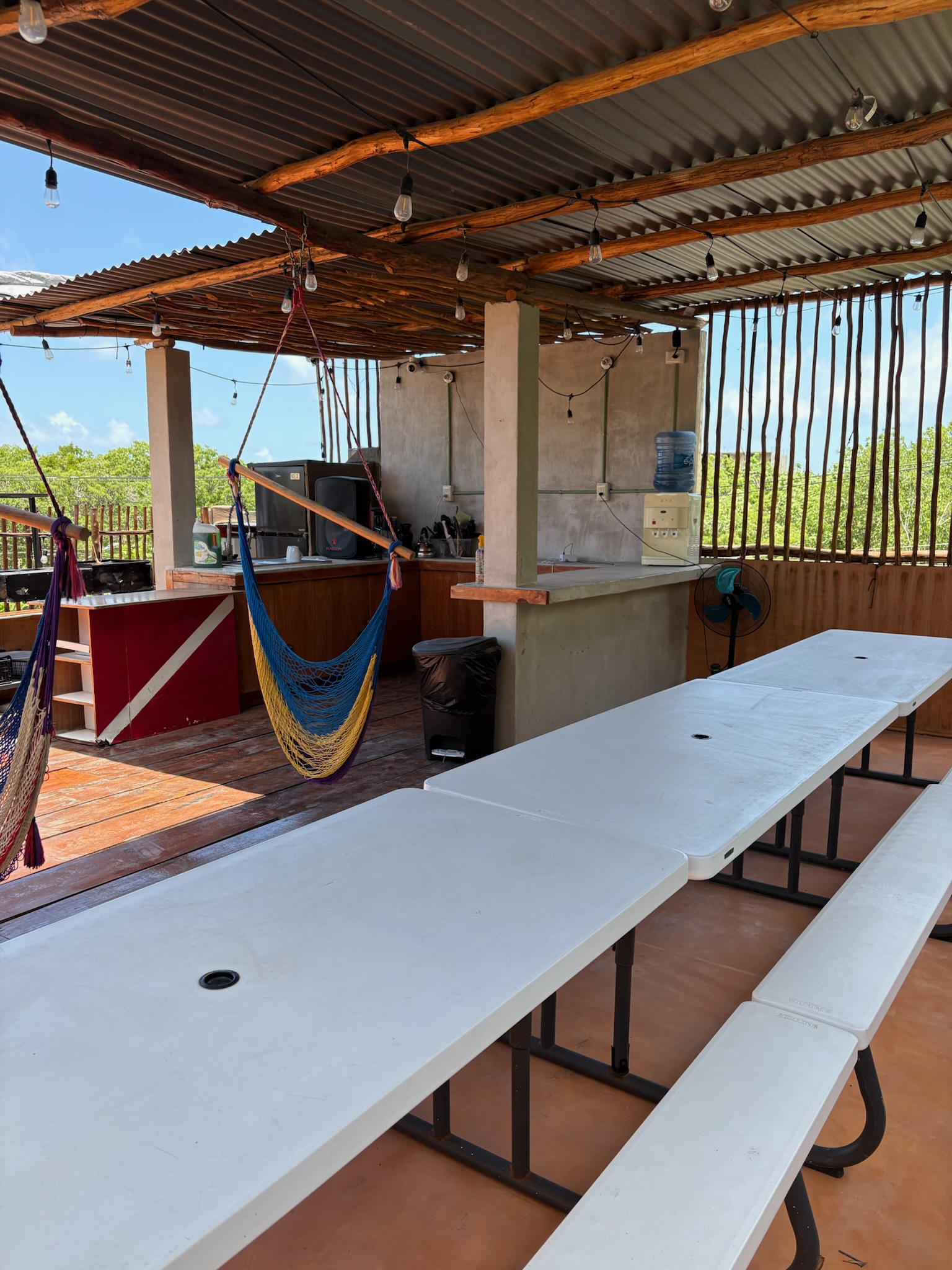 Rooftop lounge and dinner setting at Infinity2Diving